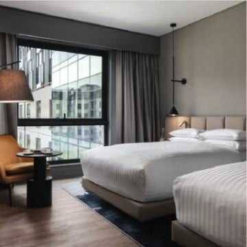 How many rooms does the Mayfair Hotel NYC have?